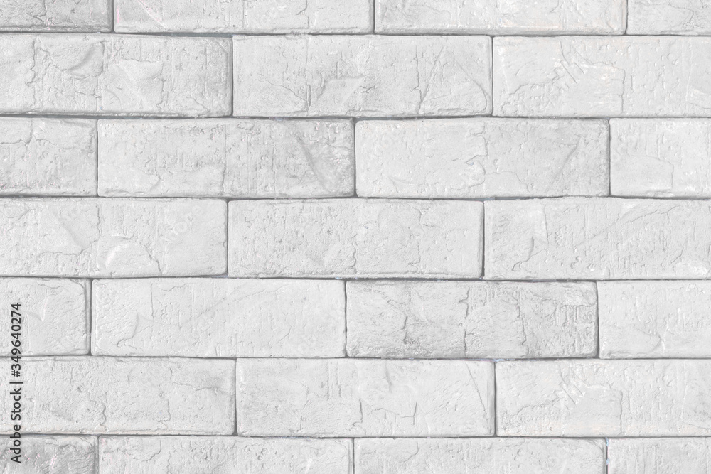 The background image of the layered white bricks. The background image of the layered white bricks.
