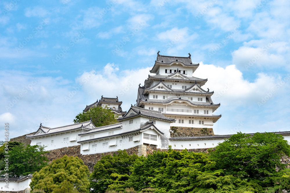 Himeji, Japan - May 06, 2019: Main tower of the Himeji Castle, the white Heron castle, Japan. UNESCO world heritage site after restauration and reopening. Himeji, Japan - May 06, 2019: Main tower of the Himeji Castle, the white Heron castle, Japan. UNESCO world heritage site after restauration and reopening.