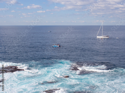 Boat Near The Rocky Shore At Bondi Sydney