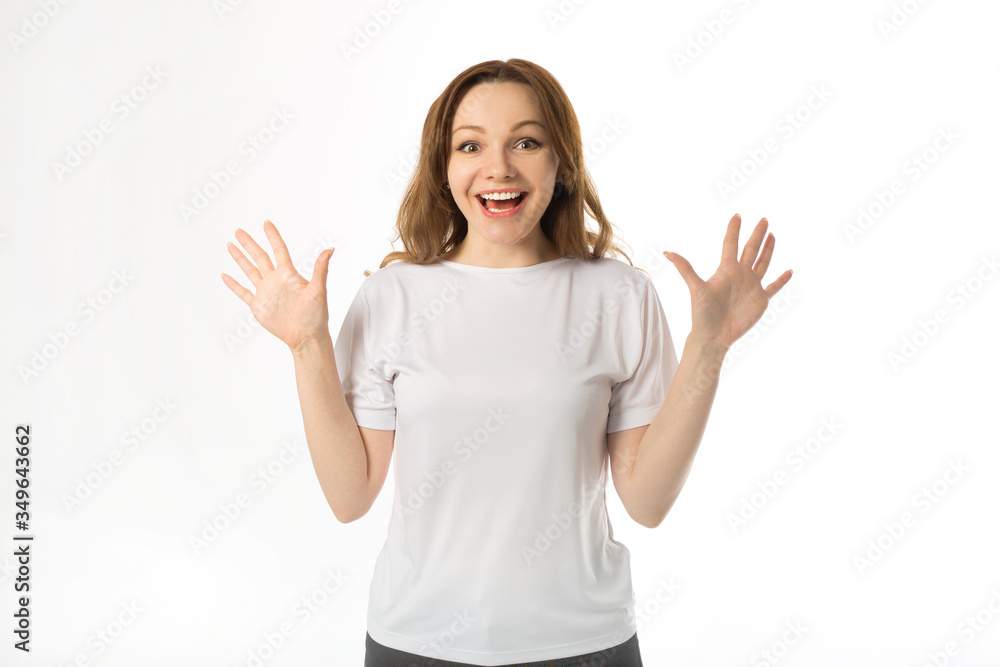 beautiful young woman in a white t-shirt on a white background
beautiful young woman in a white t-shirt on a white background