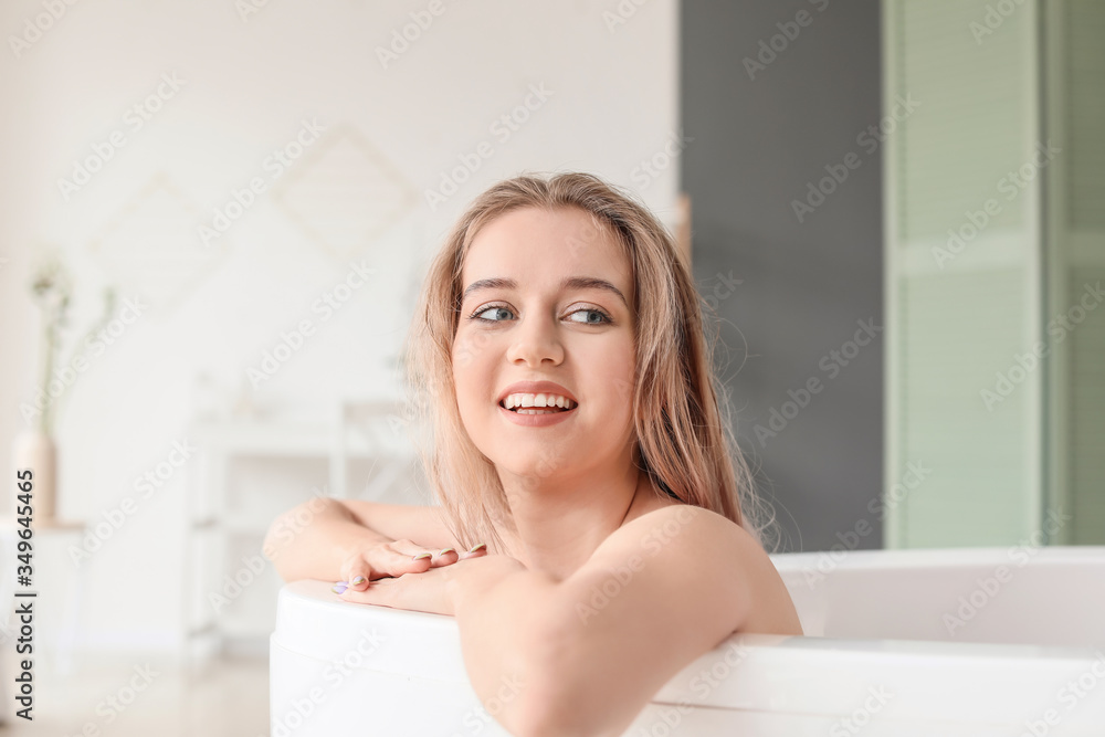 Beautiful young woman taking bath at home Beautiful young woman taking bath at home