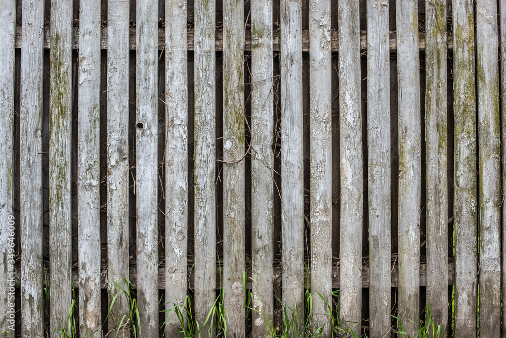 Close up of old gray wooden fence panels Close up of old gray wooden fence panels