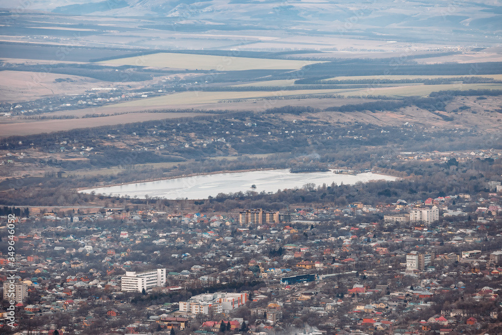 aerial view of city and lake