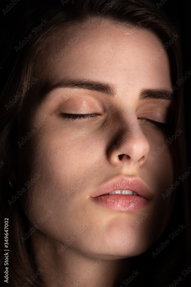 Closeup of young  girl portrait eyes closed