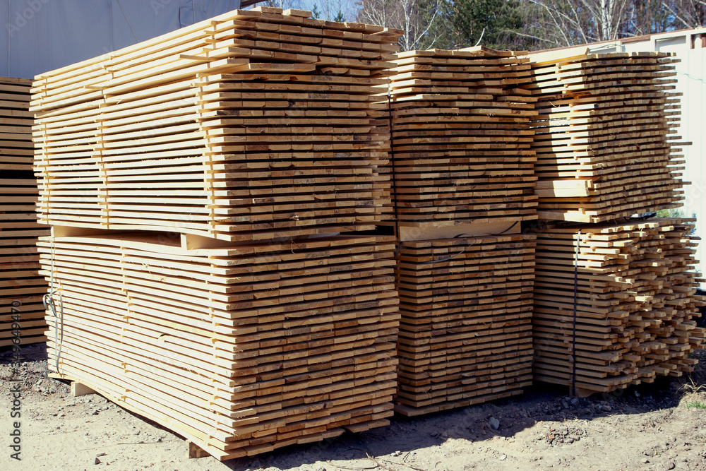 Edged boards in stock, ready for sale. construction materials. Edged boards in stock, ready for sale. construction materials.