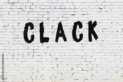 Принти на полотні Word clack painted on white brick wall