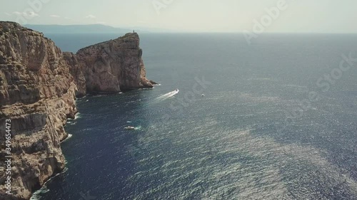 Aerial view of Capo Caccia Sardinian cliff with a lighthouse on the top 
