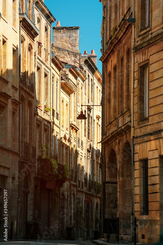 Fototapeta Naklejka Na Ścianę i Meble -  Street view of old city in bordeaux, France, typical  buildings from the region, part of unesco world heritage