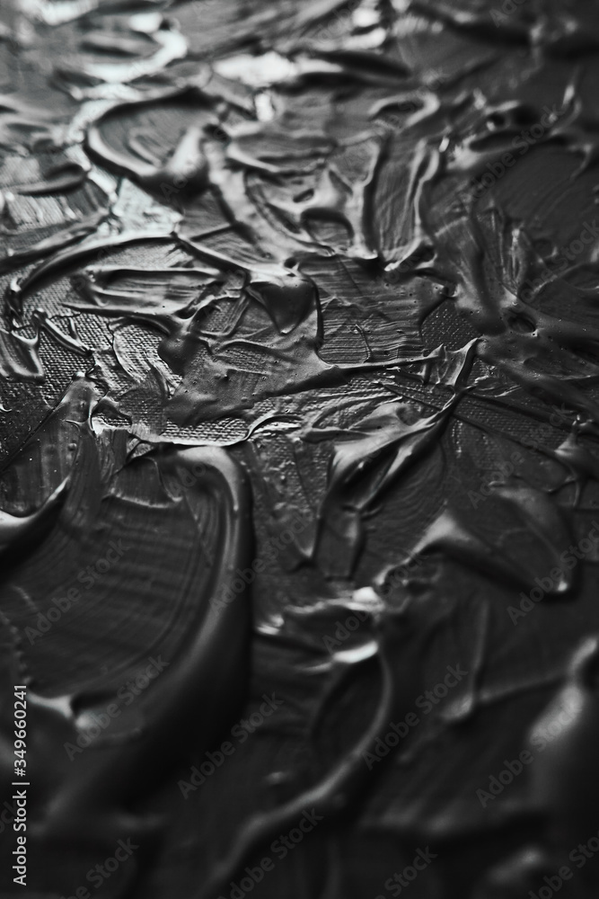 Acrylic black paint close-up. Texture background Acrylic black paint close-up. Texture background