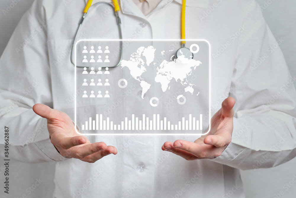 A male doctor abstractly holds graphics with a world map and medical data. A male doctor abstractly holds graphics with a world map and medical data.