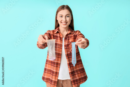 Young woman with male and f...