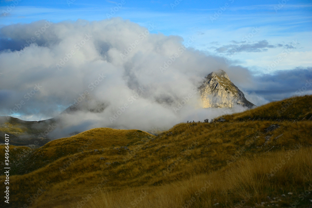 Clouds over mountains in National Park Durmitor, Montenegro.