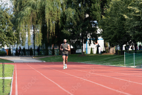 Man Running on Track