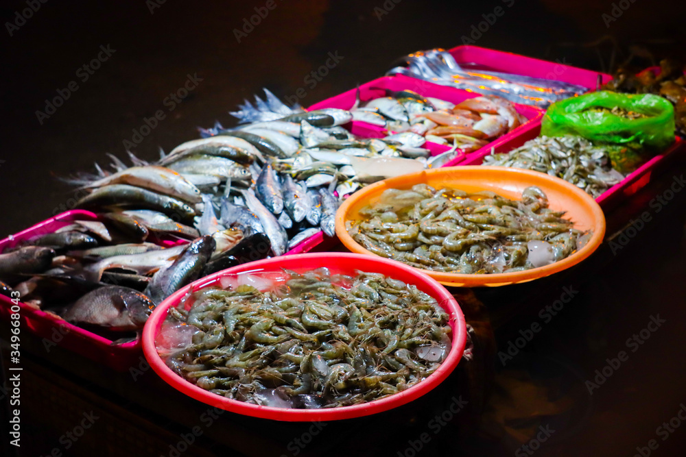 sell a variety of fish at the pagoda night market, Malang, East Java, Indonesia