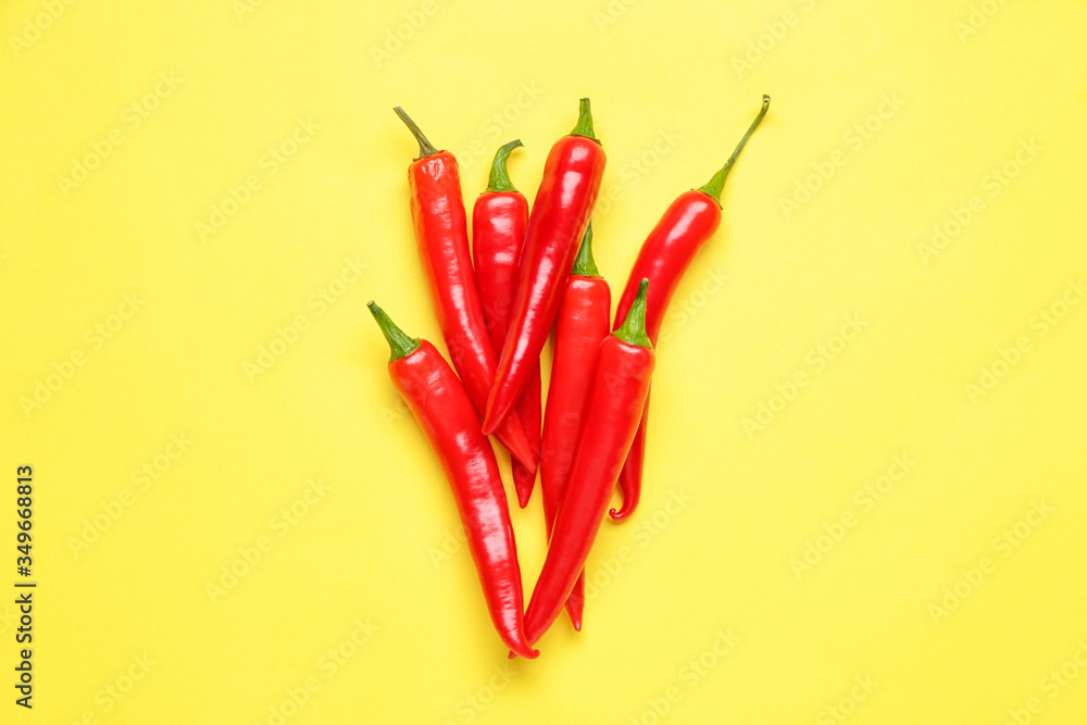 Hot chili pepper on color background - obrazy, fototapety, plakaty 