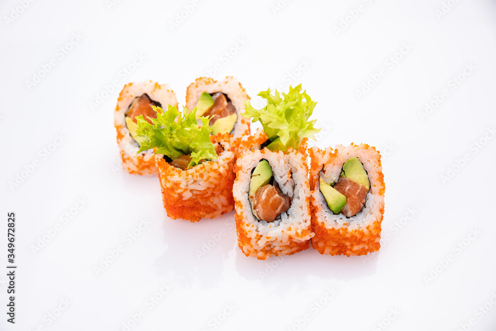 Japanese cuisine. Sushi roll on white background. Japanese cuisine. Sushi roll on white background.