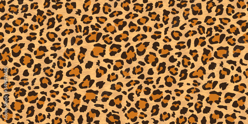 Vector illustration of a leopard. Seamless wild animal skin with print