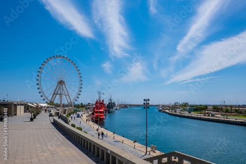 Panoramic view of the port of Valencia with the Ferris wheel in the background