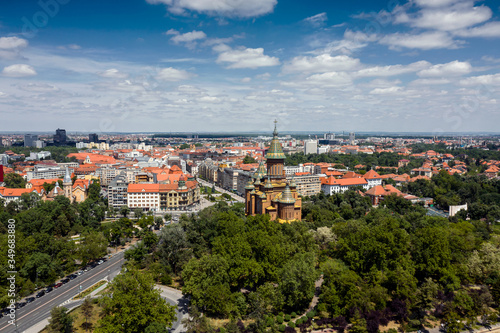 Timisoara city downtown and the central park, arial view with nice clouds on blue sky