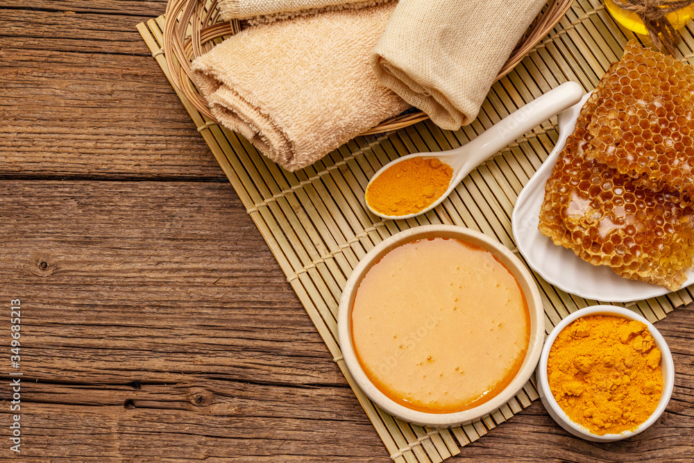 Spa concept. Self care with honey and turmeric. Natural organic cosmetics, homemade product, alternative lifestyle. Vintage background Spa concept. Self care with honey and turmeric. Natural organic cosmetics, homemade product, alternative lifestyle. Vintage background