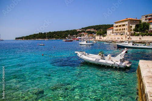 Boats anchored in a small bay south of Hvar city on Hvar island in Croatia - Dalmatian summer in the Adriatic Sea