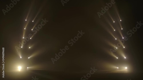 Stage with spot lighting, shining empty scene for holiday show, award Ceremony or advertising on the gold spotlight Background. photo