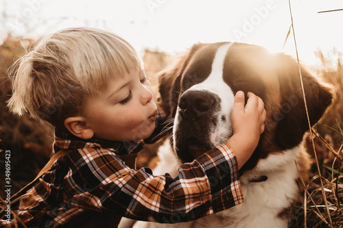 фотографія A boy and his dog