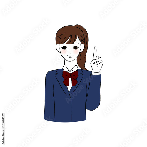 笑顔で指をさす女子学生