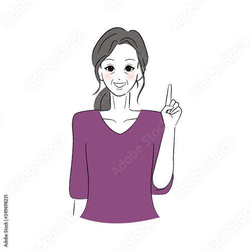 笑顔で指をさすシニア女性