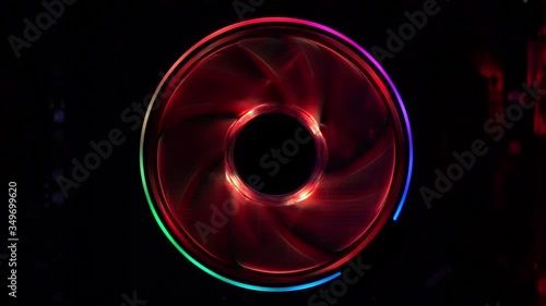 Colorful computer cooling fan spinning photo