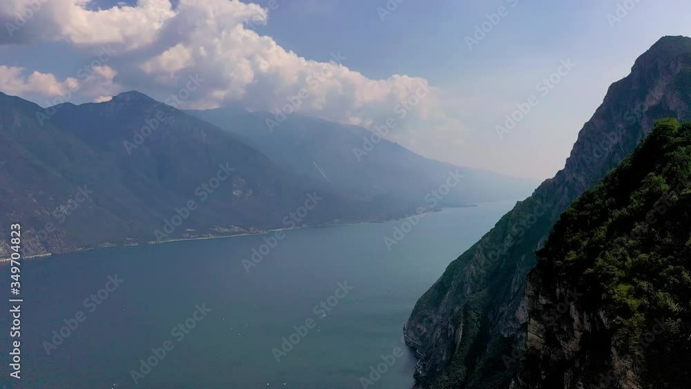 Aerial video with drone, view of the beautiful Lake Garda in the summer time , Trentino Alto Adige region,Italy Aerial video with drone, view of the beautiful Lake Garda in the summer time , Trentino Alto Adige region,Italy