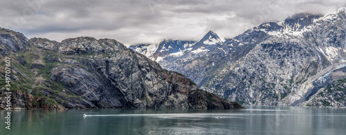 Mountains & Ocean with cloudy sky at Glacier Bay Alaska