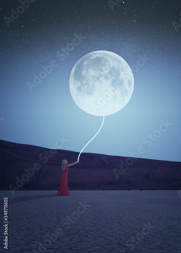 Tablou pe pânză Night scene of a woman in red dress holding a glowing rope attached to a moon in the sky