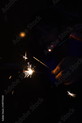 sparkler in hands