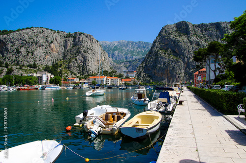 Canyon at the mouth of the Cetina river in Omis, Croatia - Small canoe by the Adriatic Sea on the Makarska riviera