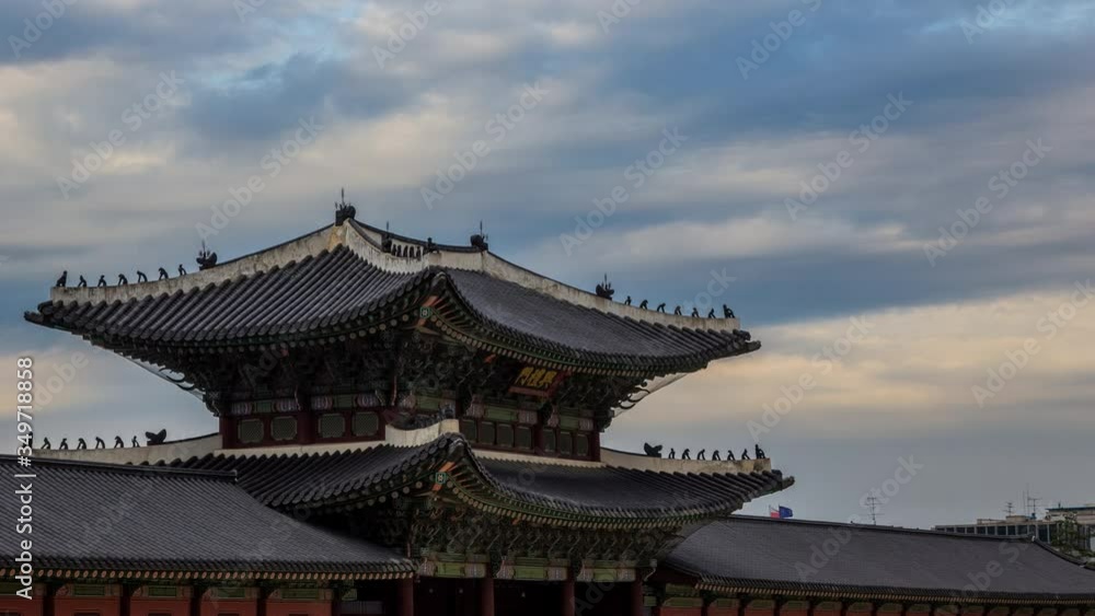 Timelapse shot of Heungryemun Gate at daytime, south entrance to Gyeongbok Palace. the word is Timelapse shot of Heungryemun Gate at daytime, south entrance to Gyeongbok Palace. the word is
