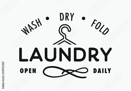 Laundry sign, wash, dry, fold, open daily for laundry room