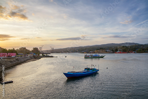boats on the river at sunset. kendari city bay, southeast Sulawesi, Indonesia