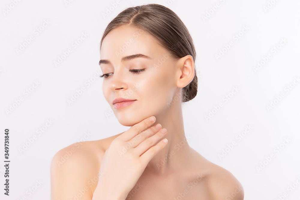 Beautiful Young Woman touching her clean face with fresh Healthy Skin, isolated on white background, Beauty Cosmetics and Facial treatment Concept Beautiful Young Woman touching her clean face with fresh Healthy Skin, isolated on white background, Beauty Cosmetics and Facial treatment Concept