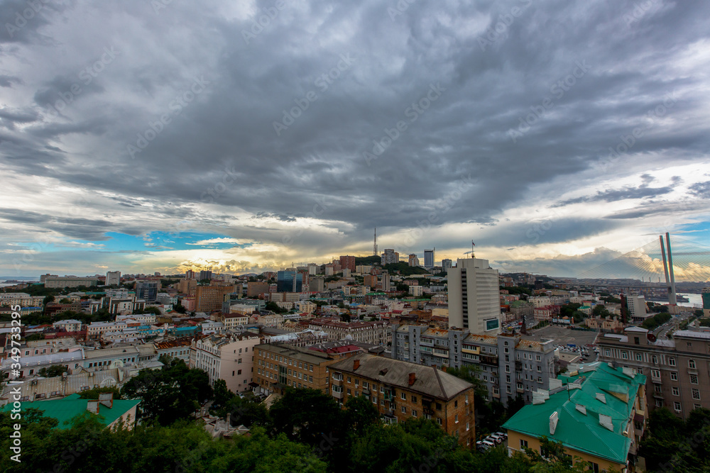 Summer, 2016 - Vladivostok, Russia - From Above. Panoramic view of the central part of Vladivostok. The historic center of the sea city on a background of cloudy sky.