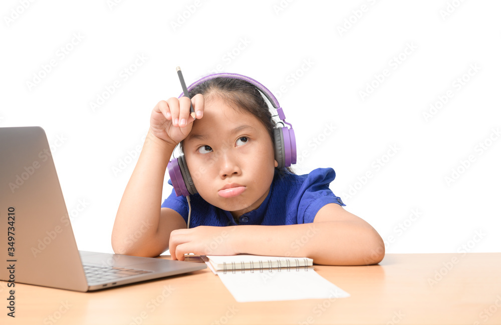 School girl watching online education classes feeling bored and depressed at home School girl watching online education classes feeling bored and depressed at home
