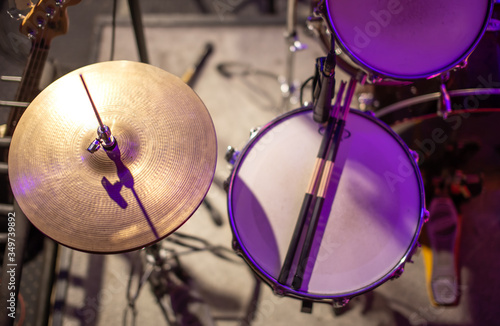 Drums, cymbals, hi hat on a beautiful background in the recording Studio. Room for musicians ' rehearsals. The concept of musical creativity.