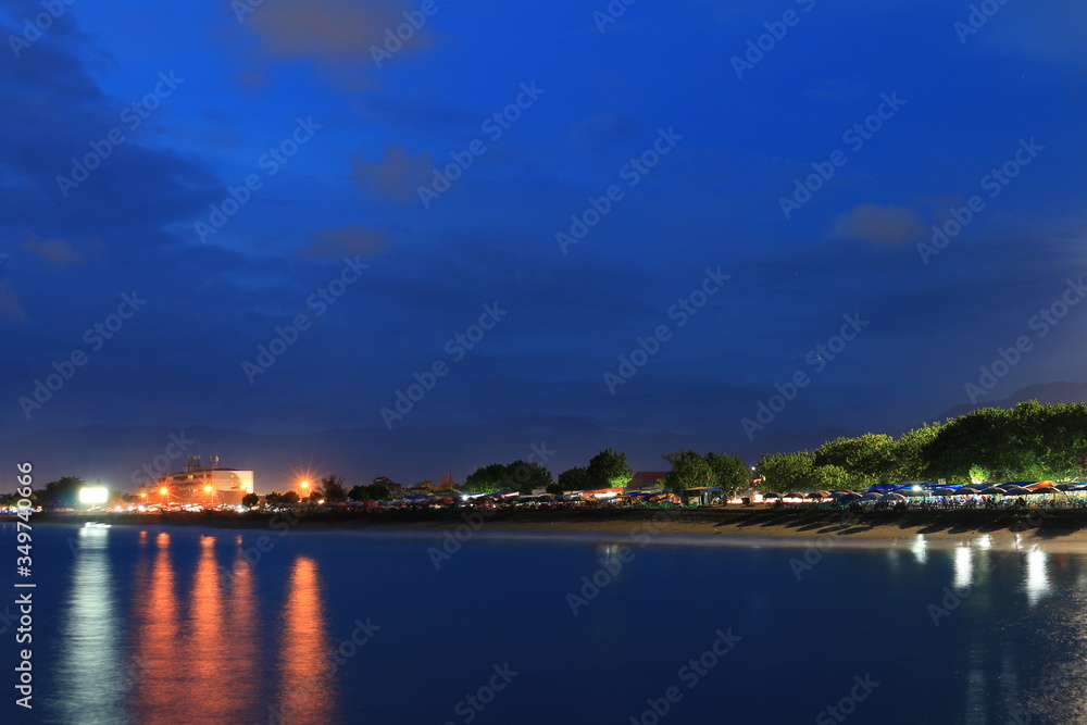 When dusk comes on the coast Puruih Padang, West Sumatra