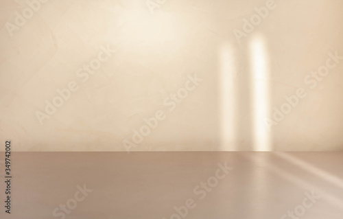 Fototapeta Blank beige product display backdrop template with lights and shadows