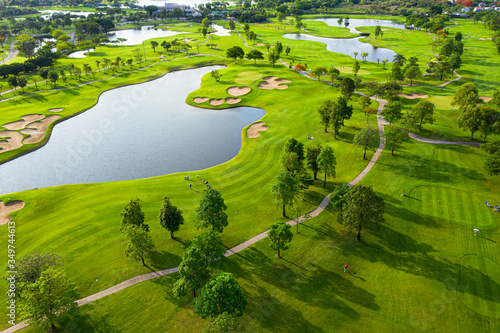 Golf course sport Aerial top view of golf field landscape with sunrise view in the morning shot. Bangkok Thailand © AU USAnakul+