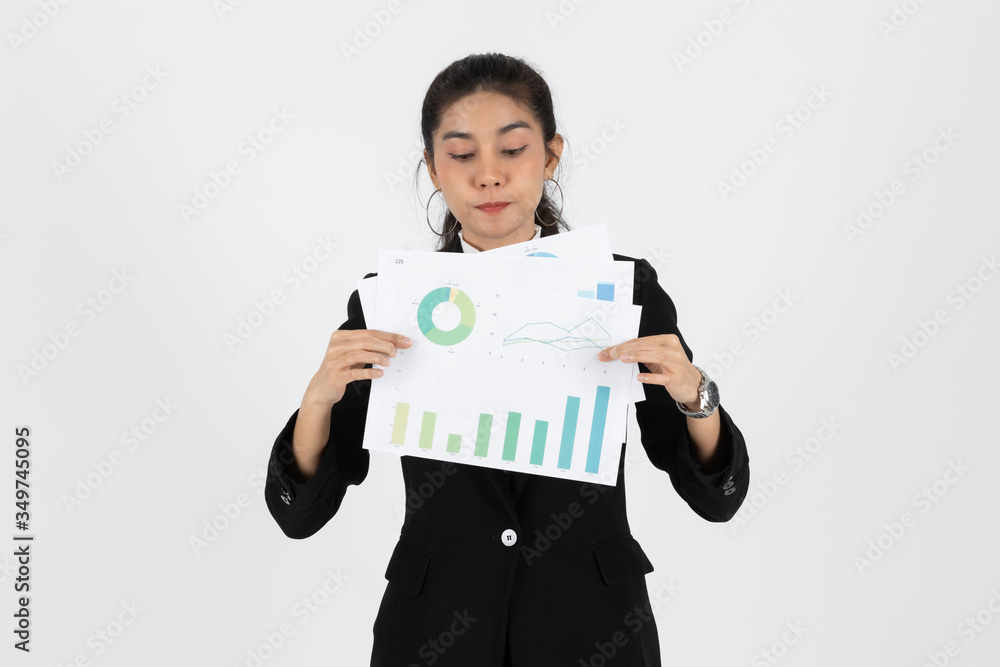 Success young Asian business woman showing charts or paper work over white isolated background. Success young Asian business woman showing charts or paper work over white isolated background.