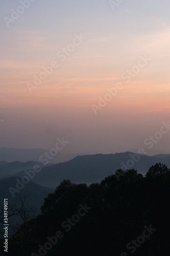 The sky and the mountains alternate after the sun sets.