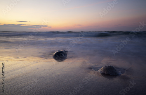 Fototapeta Naklejka Na Ścianę i Meble -  Sunset over the baltic sea photographed with long exposure