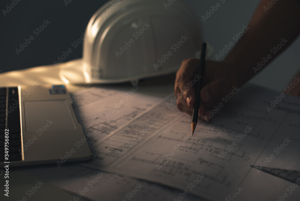 Architect working on blueprint. Architects workplace - architectural ...