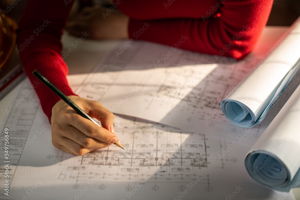 Architect working on blueprint. Architects workplace - architectural ...